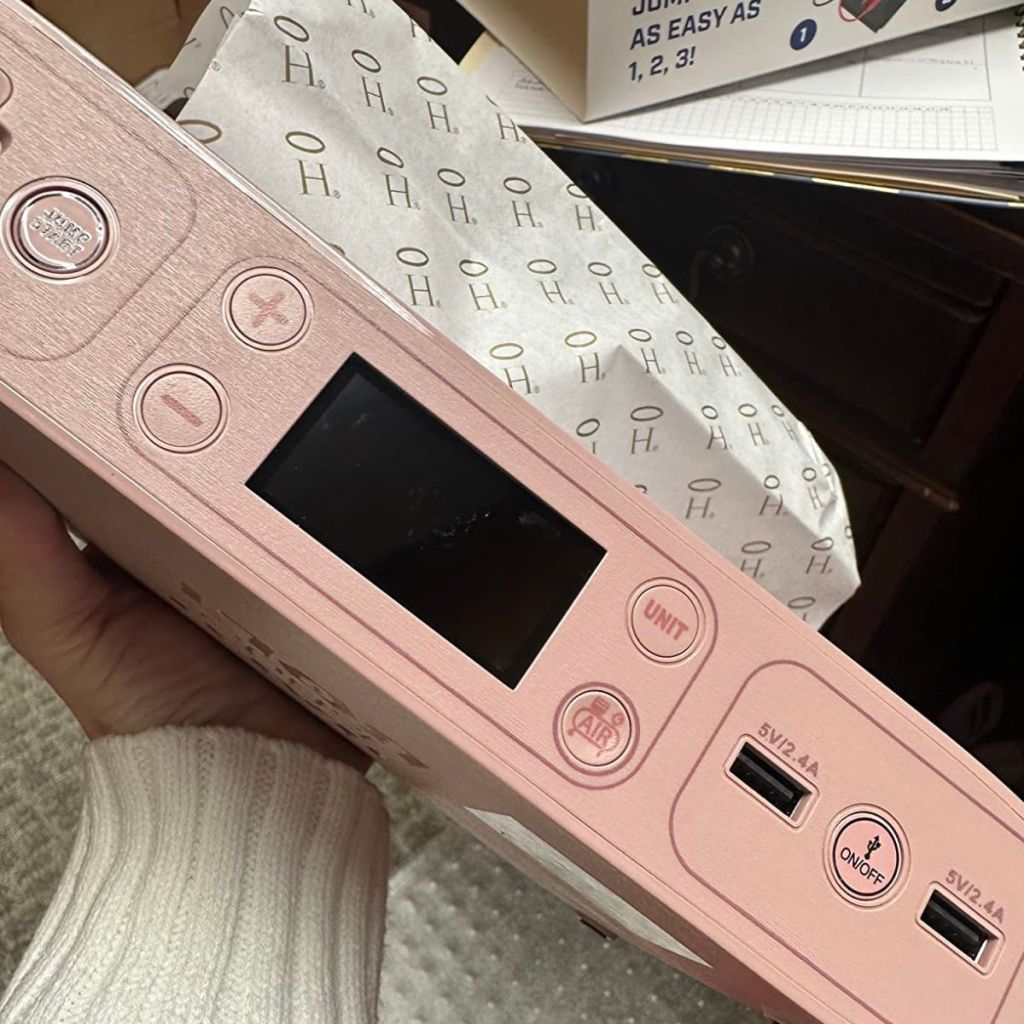pink portable car jump starter