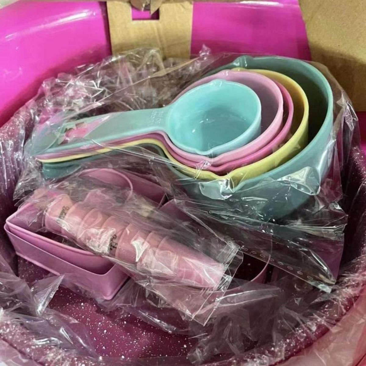 pack of pink and pastel colored baking supplies