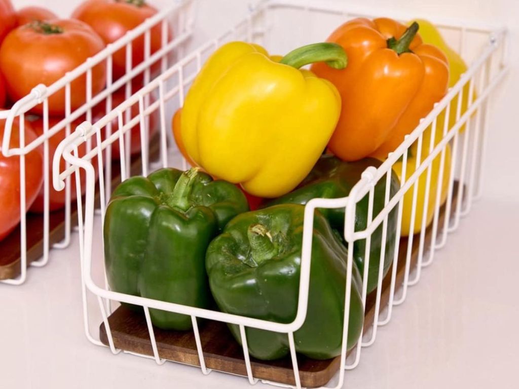 wire basket filled with bell peppers