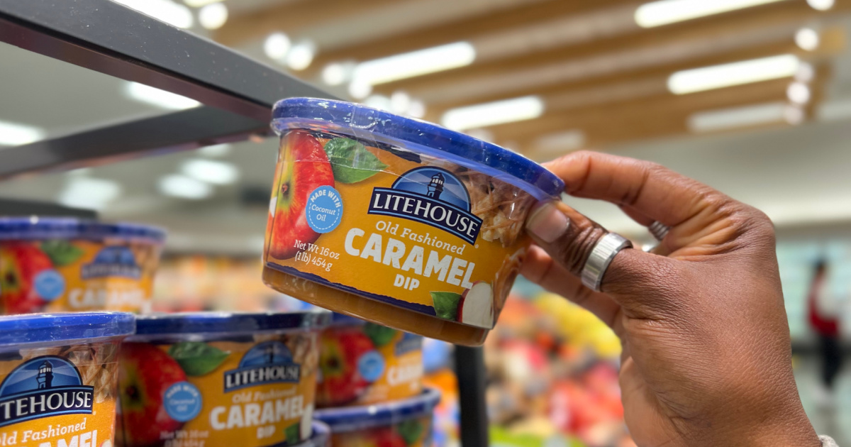 hand taking Litehouse Caramel dip from store shelf