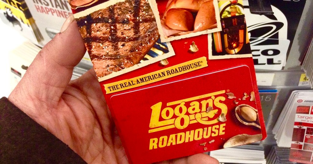 hand holding logans giftcard