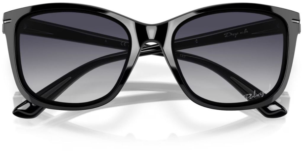 front view of folded black framed Oakley sunglasses