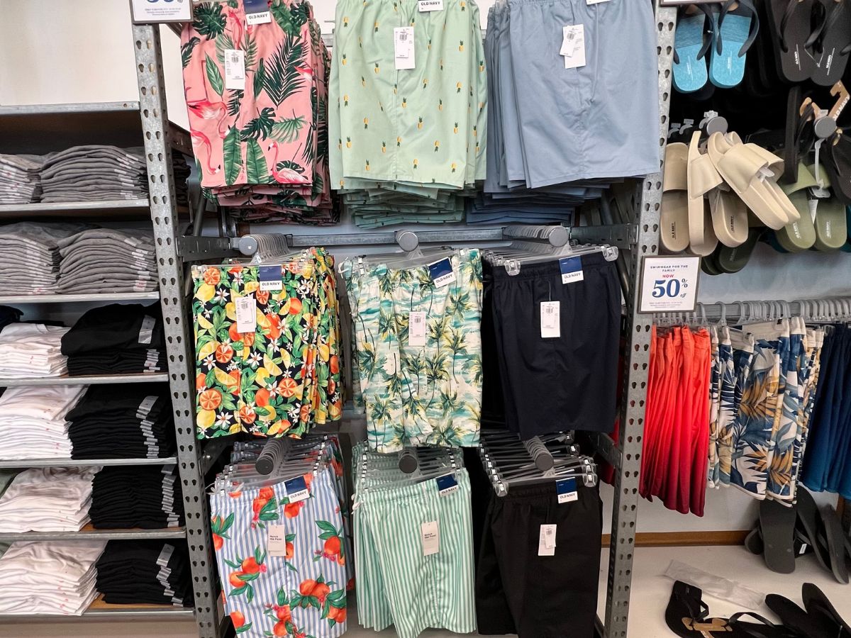 mens swimsuits hanging in store at Old Navy
