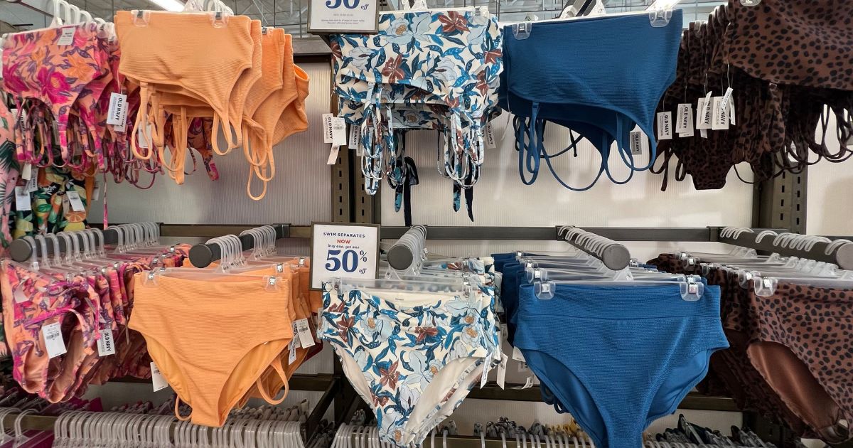 womens swimsuits hanging in store at Old Navy