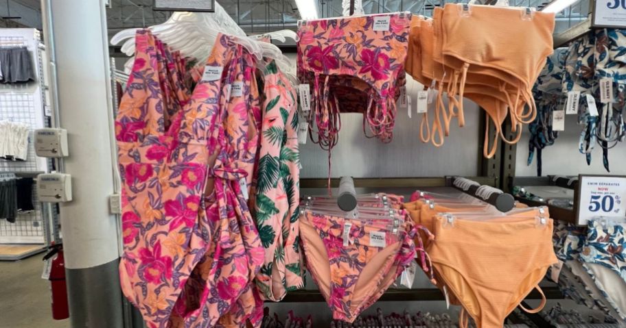 women's bathing suits on display in store