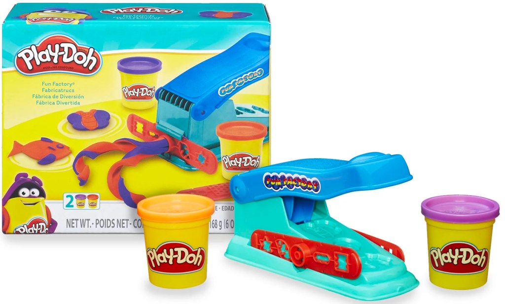 play doh factory shape making set box with all pieces laid out in front of it. 