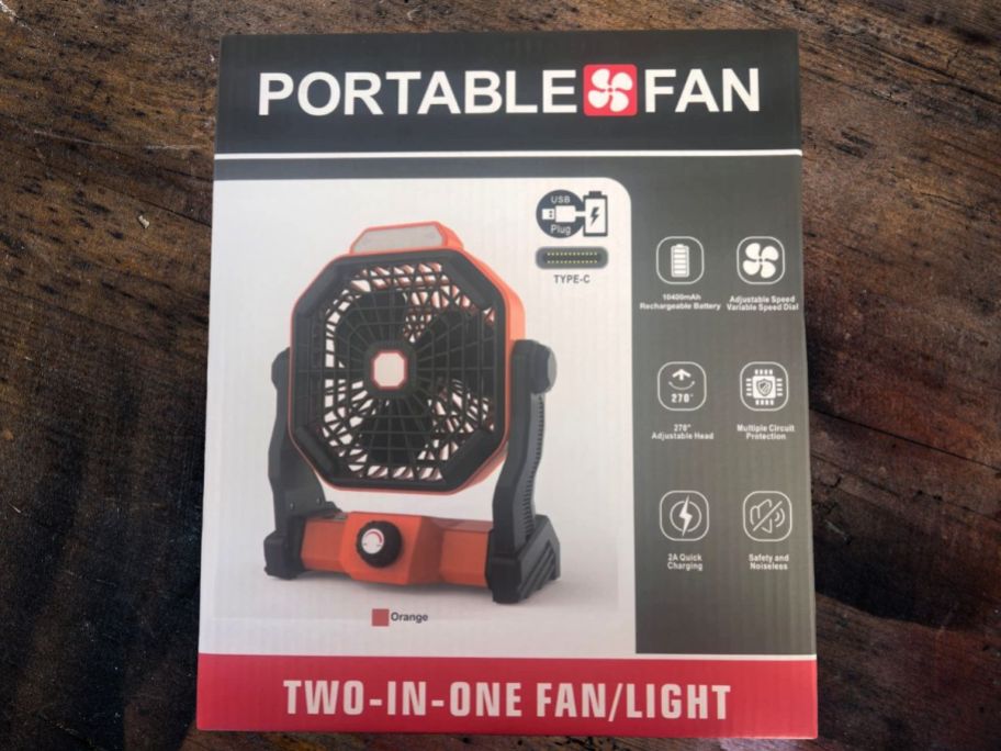 portable fan in box on table 