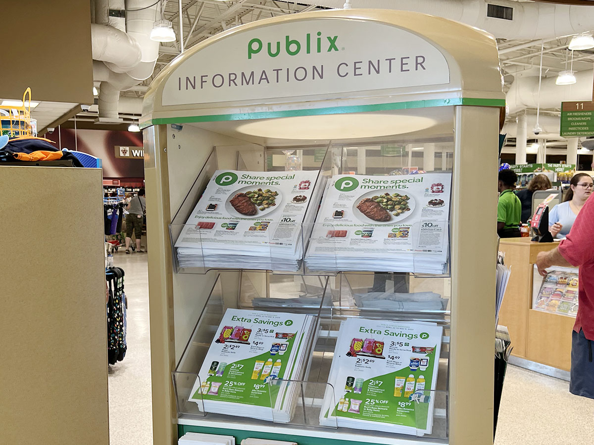 publix information center stand with weekly ads 