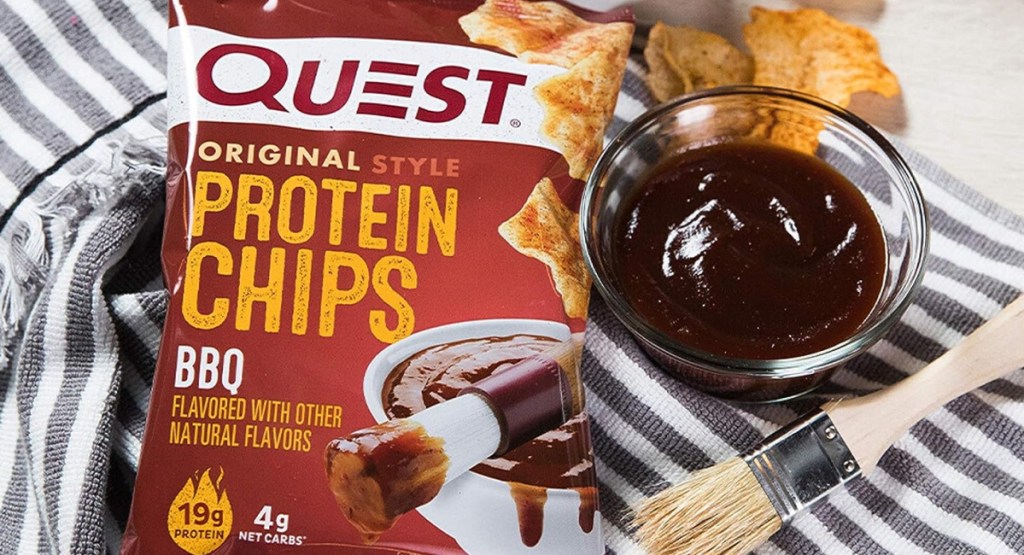 quest protein chips in BBQ with sauce next to it