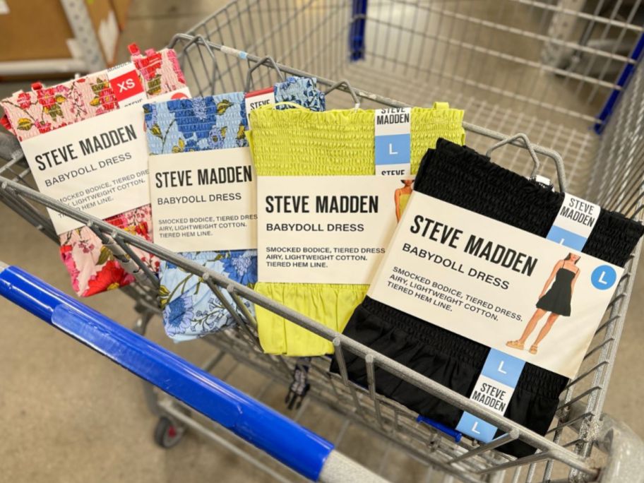 A Sam's Club shopping cart with Steve Madden Babydoll dresses in the front basket