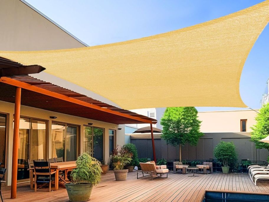 Shade&Beyond 8'10' Rectangular Sun Shade Sail Canopy in Sand over patio