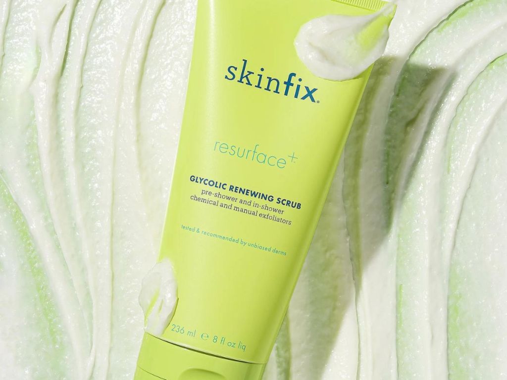 bottle of skinfix resurface with cream on bottle and in background