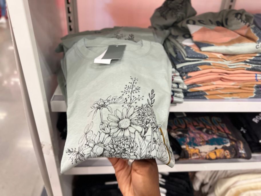 target women's floral graphic tee folded in store