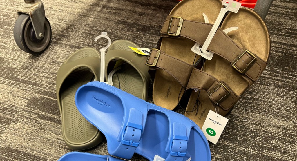three different men sandals displayed on the floor of target