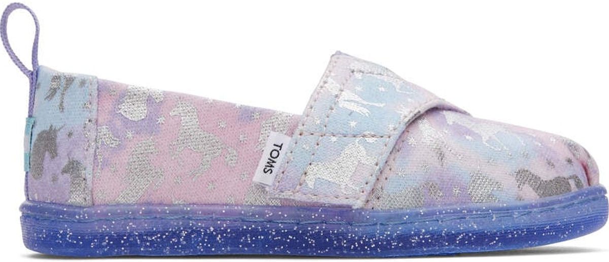 toms purple unicorn kids shoes stock image