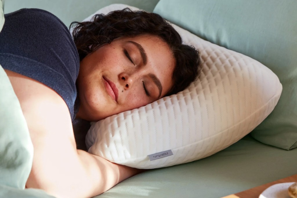 woman sleeping on foam pillow