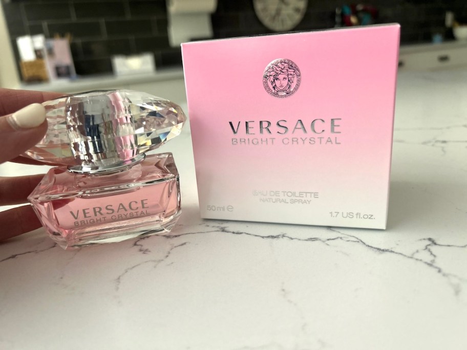 bottle of versace perfume on counter