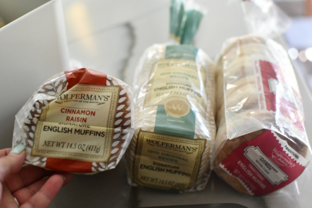 three packages of english muffins