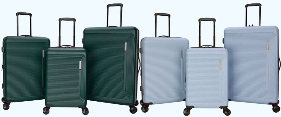 two sets of luggage in 3 sizes in dark green and light blue