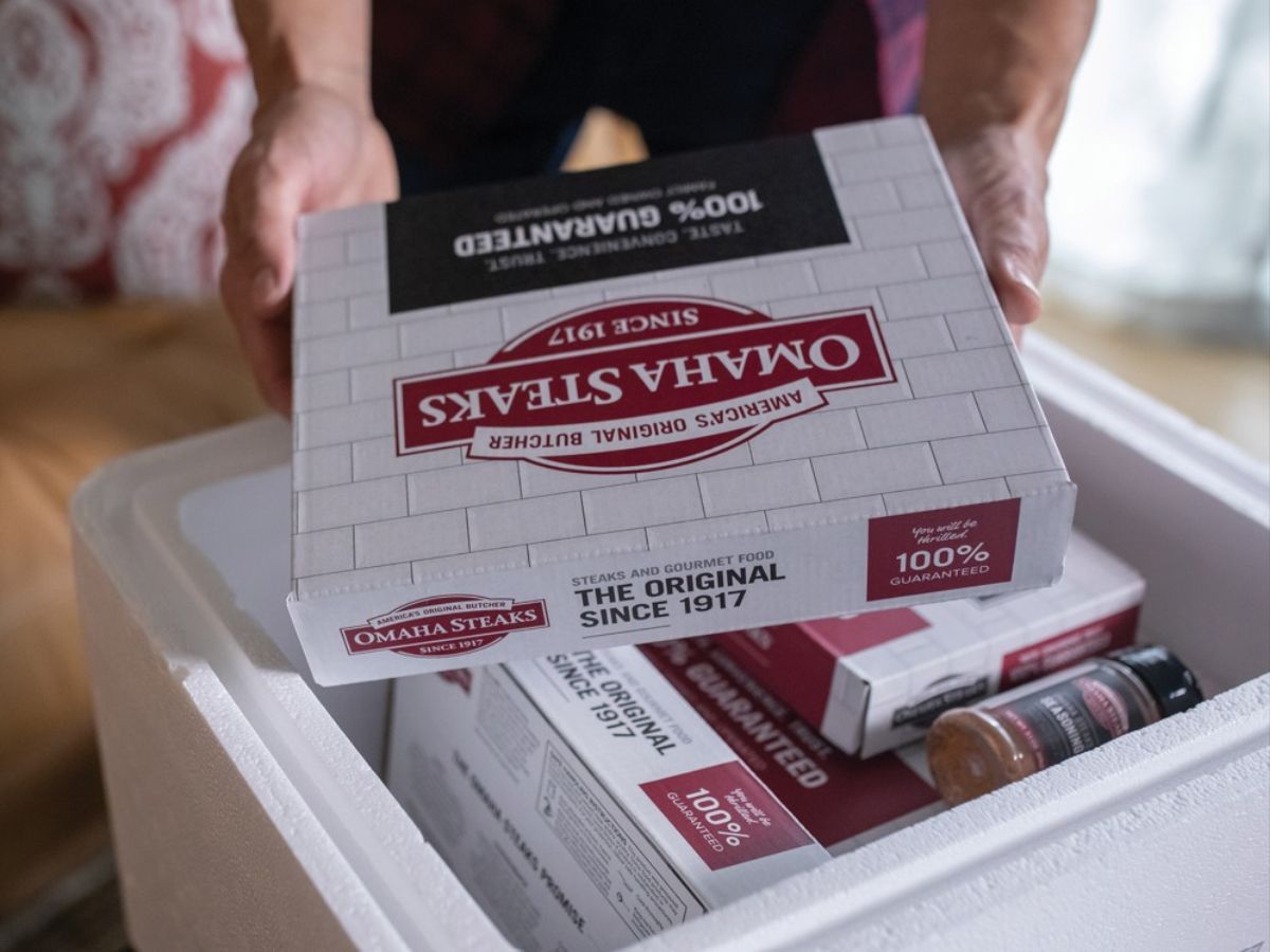 A foam cooler filled with Omaha Steaks products