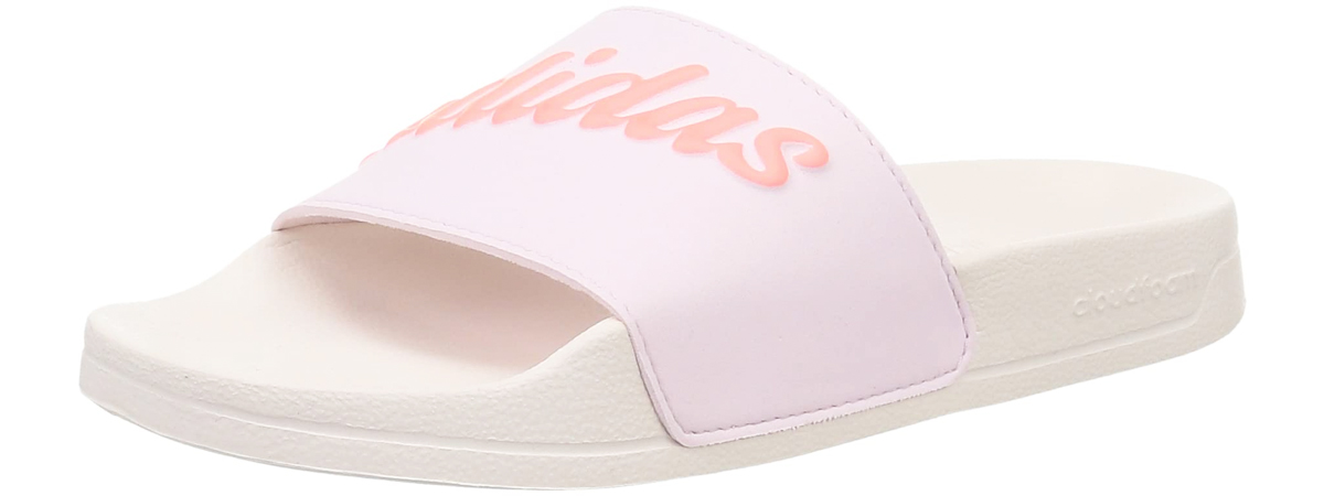 white and pink slide that says adidas on top