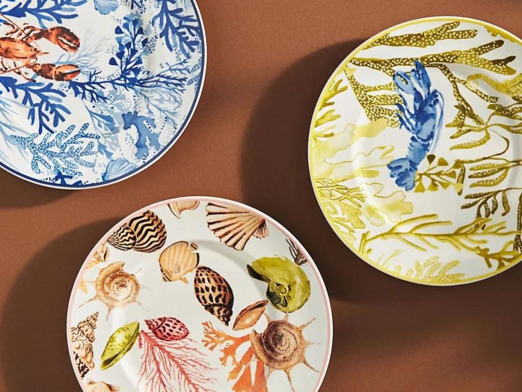 3 dessert plates with sea life painted on them