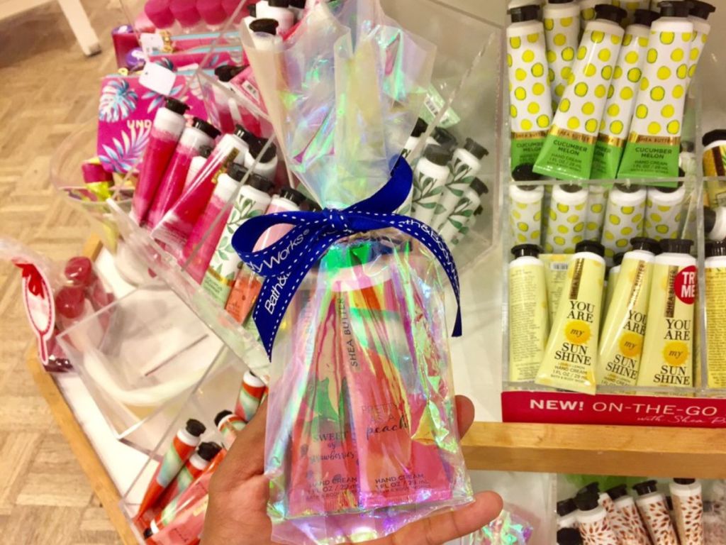 Hand holding up a Bath & Body Works Gift Set 
