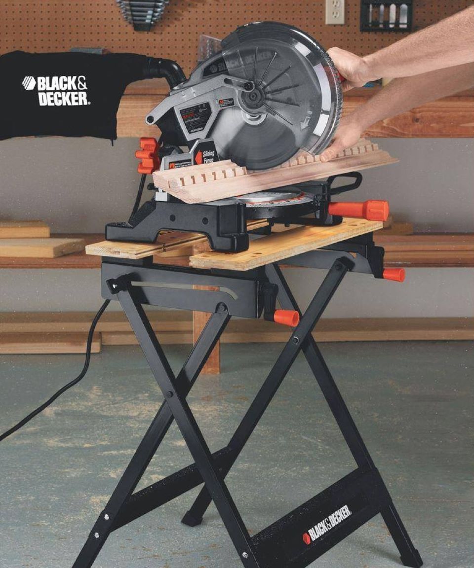 Portable workbench with a saw on it