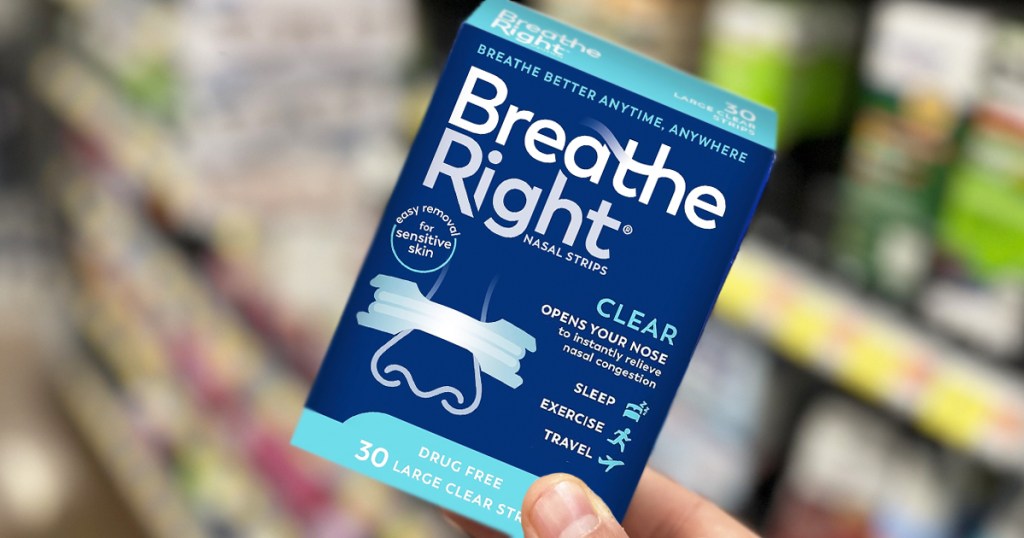 hand holding a box of Breathe Right Nasal Strips in store