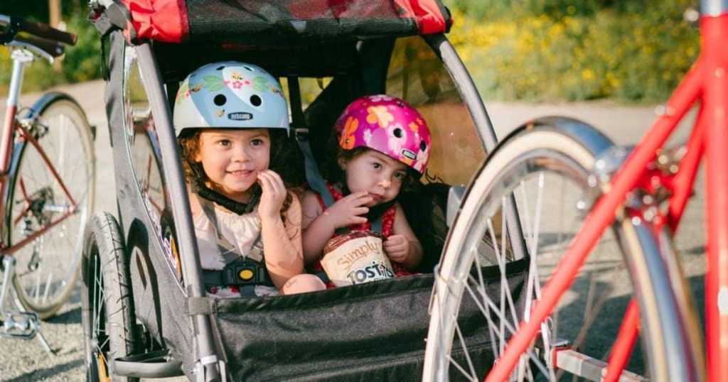 2 kids in Burley bike trailor stroller