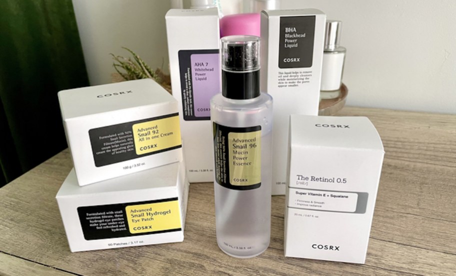 various cosrx beauty products on wood table