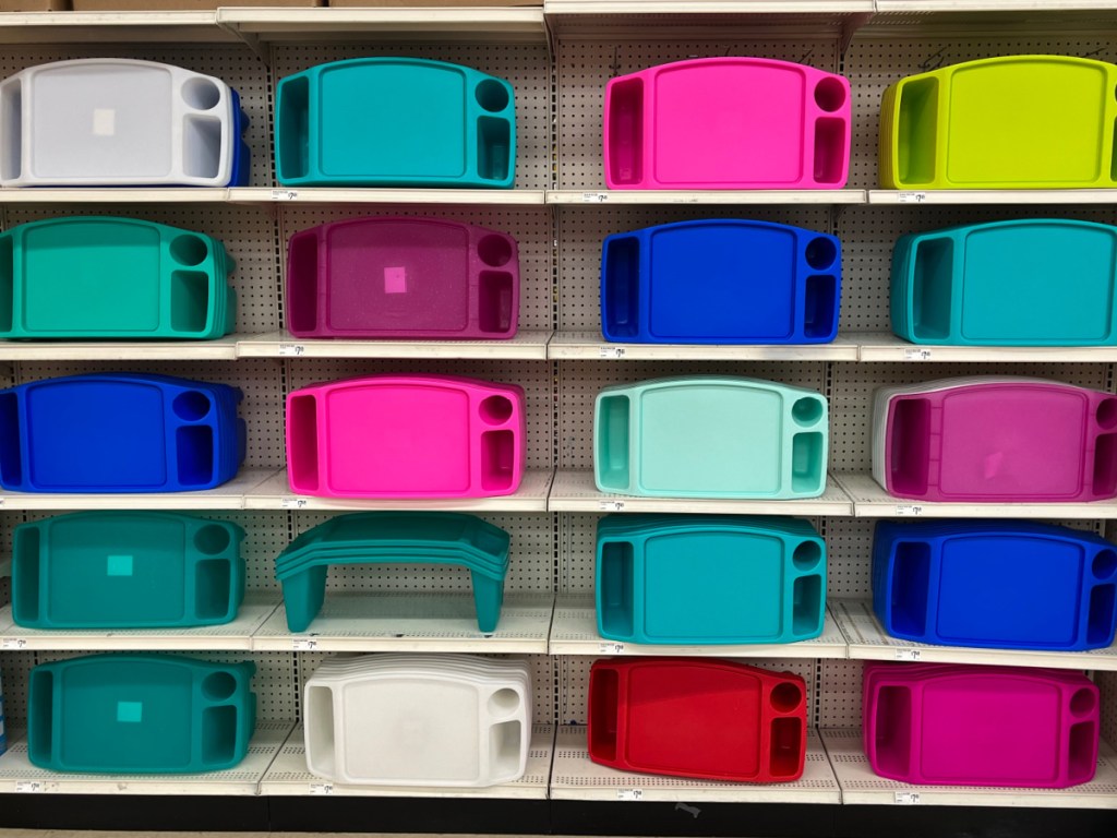 colorful display of Creatology Lap Trays at Michaels