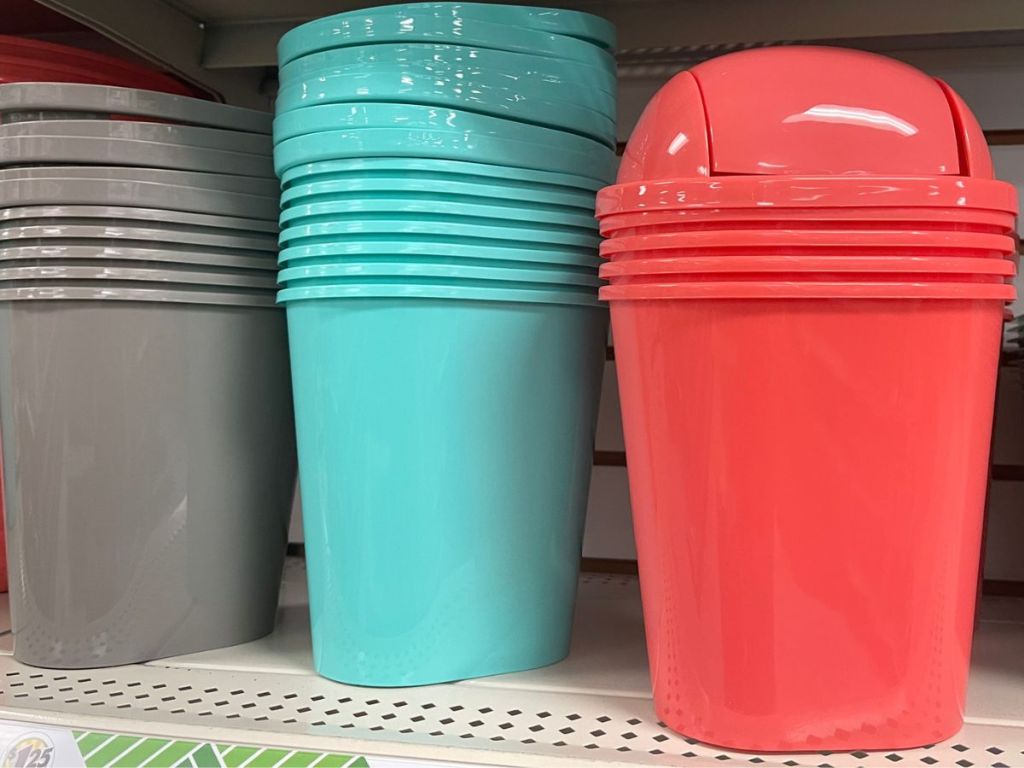 shelf full of colorful flip top storage baskets at Dollar Tree