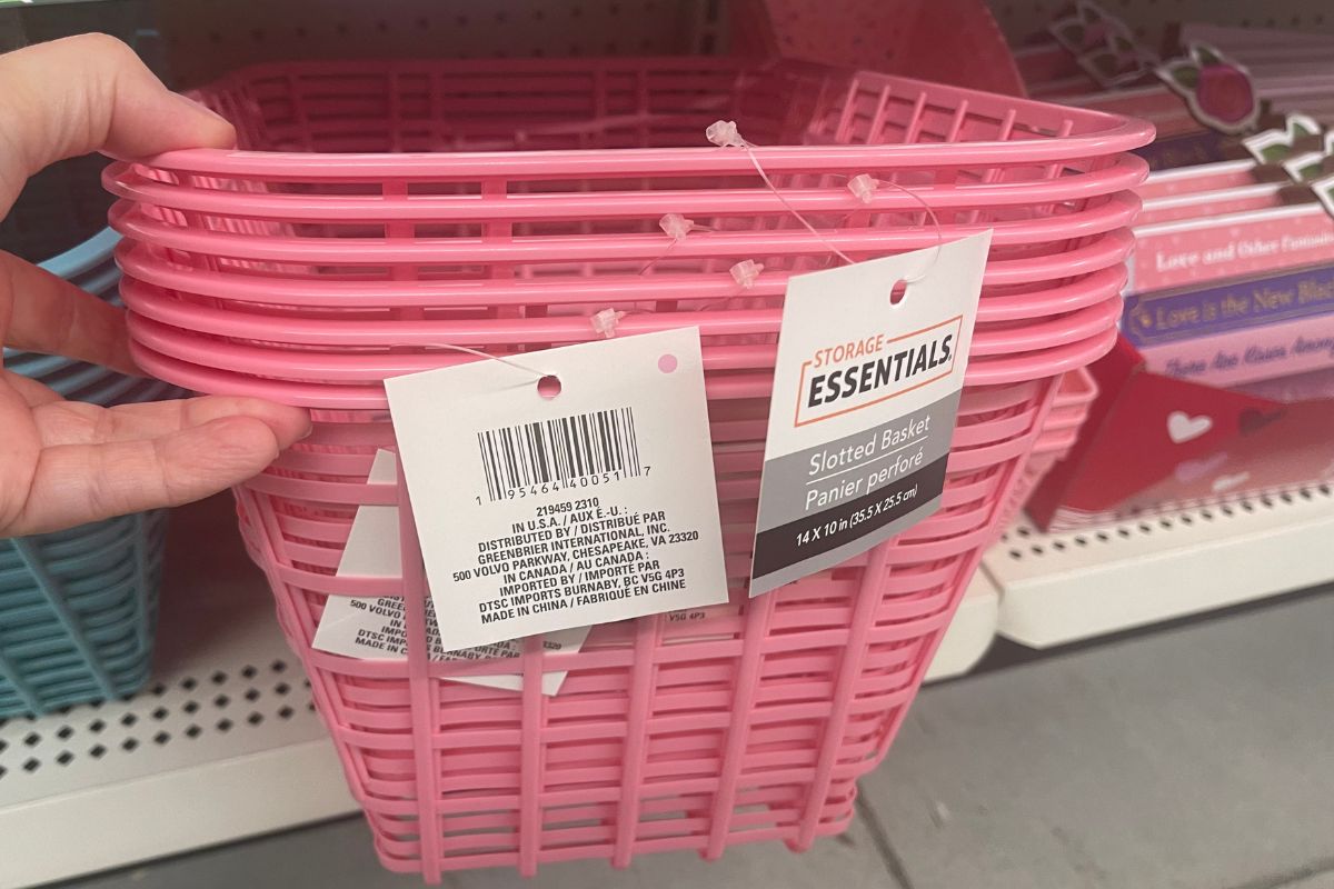 a stack of pinks Slotted Plastic Baskets