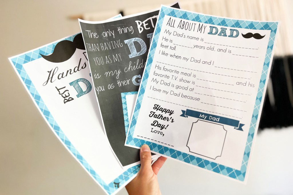 Hand holding free Father's Day Printables