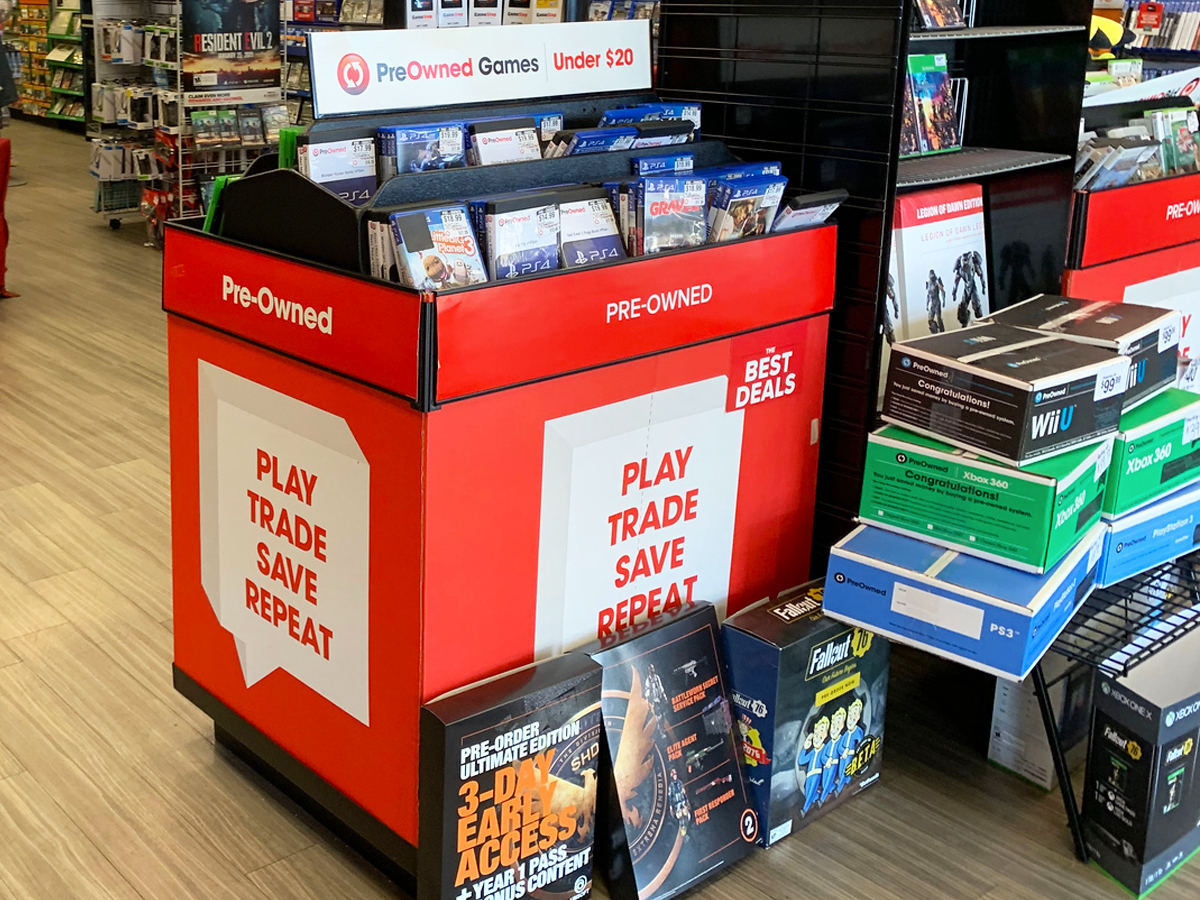 display of pre-owned games in gamestop store