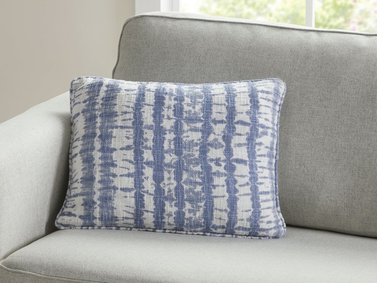 Gap HomeBlue Striped Throw Pillow on a chair