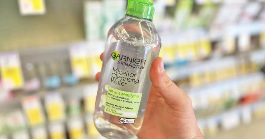 hand holding a bottle of Garnier Micellar Water in store