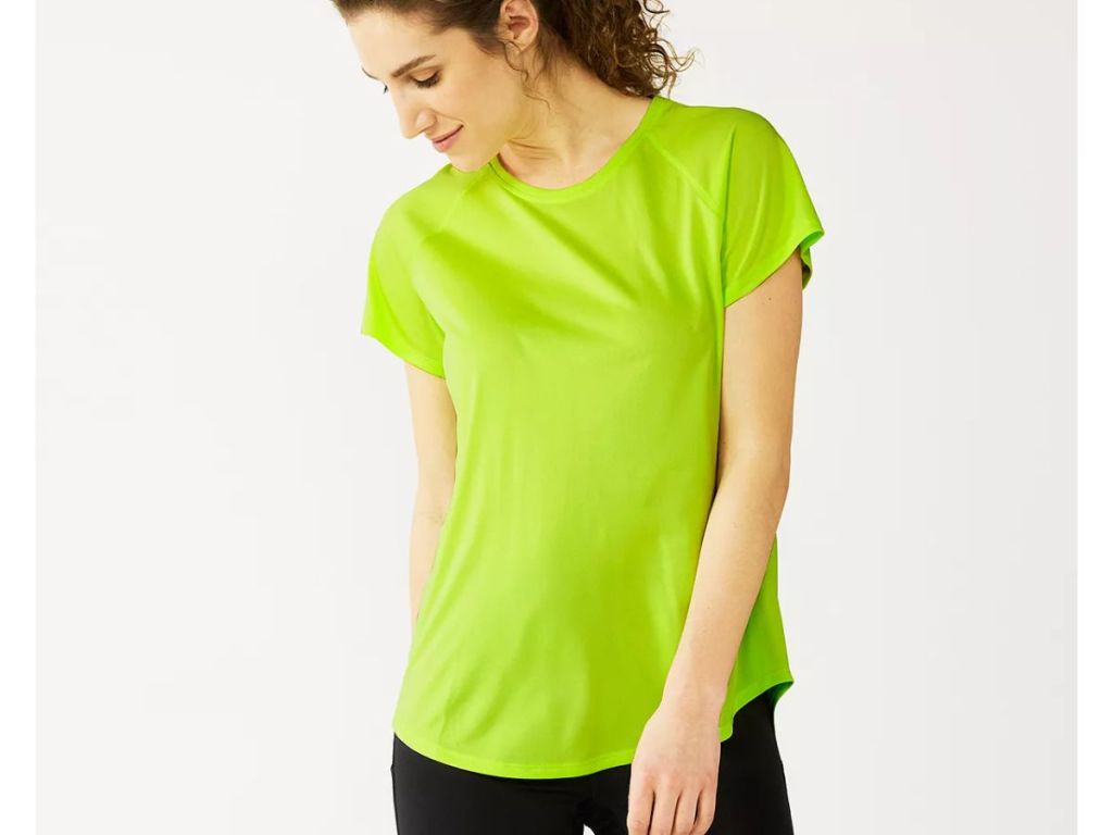 a woman in a green t shirt