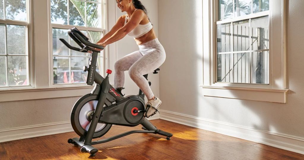 woman riding an Echelon Connect Sport Indoor Cycling Exercise Bike