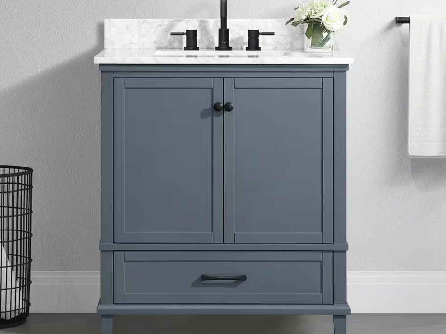 dusty blue bathroom vanity with white top