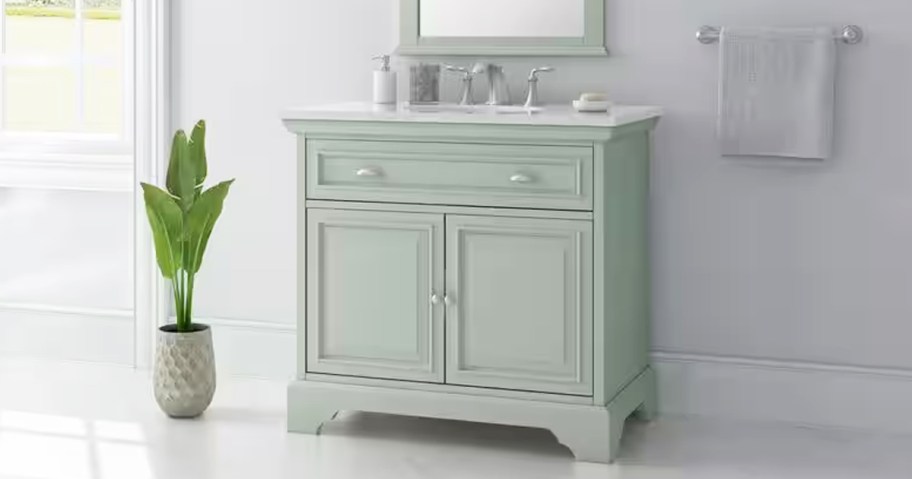 light green vanity with marble top