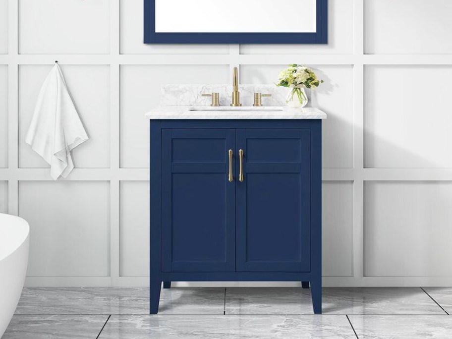 navy blue bathroom vanity with marble top