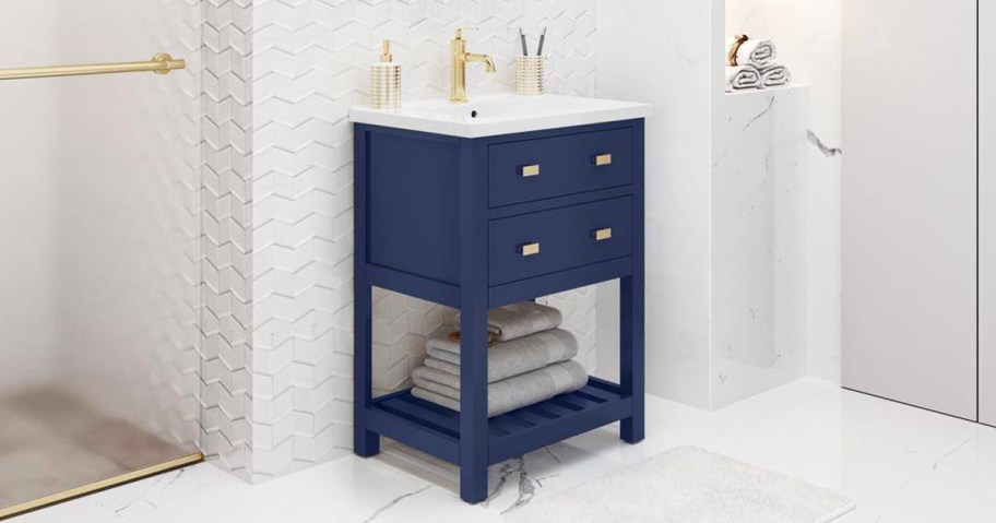 blue vanity in bathroom with white top