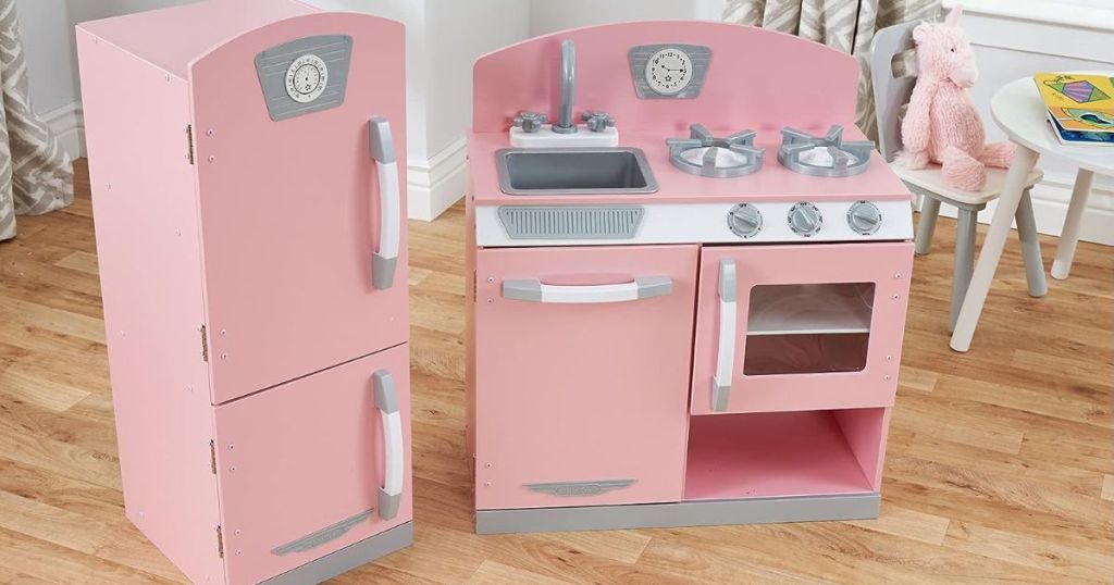 pink kitchen set and refrigerator 