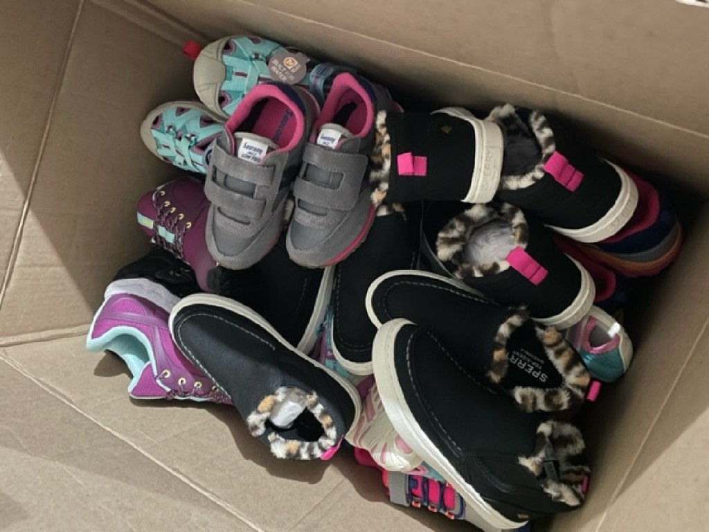 A box full of kids shoes