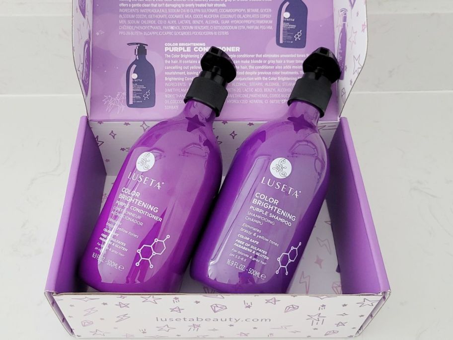 two bottles of Luseta Purple shampoo and conditioner in the box it comes in
