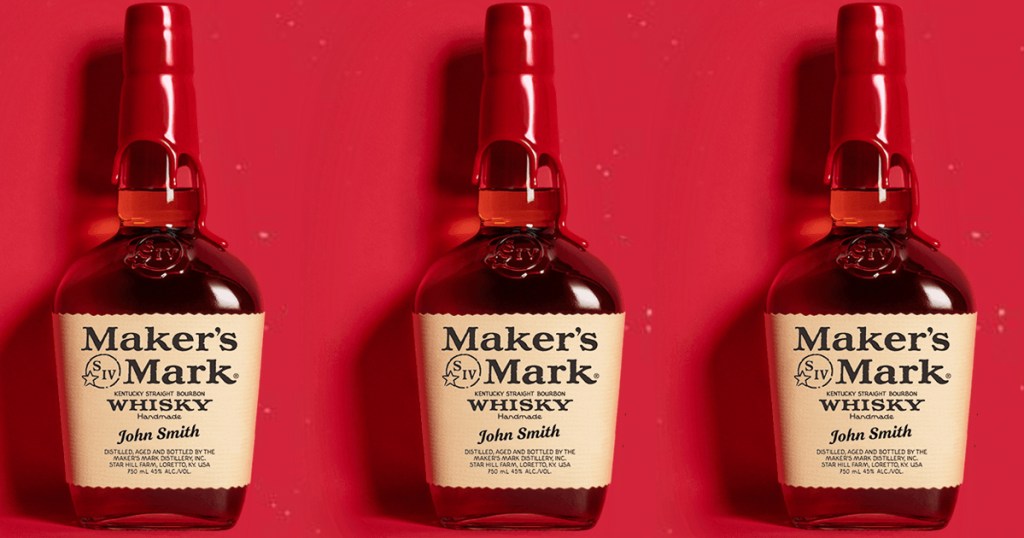 three bottles of Maker's Mark whiskey with personalized labels