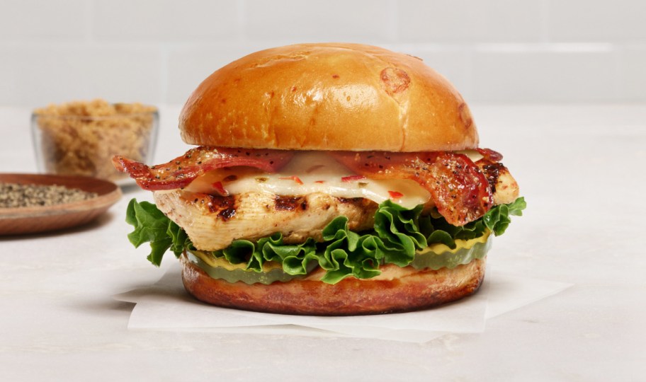 Chick Fil A Maple Pepper Bacon Sandwich on a counter