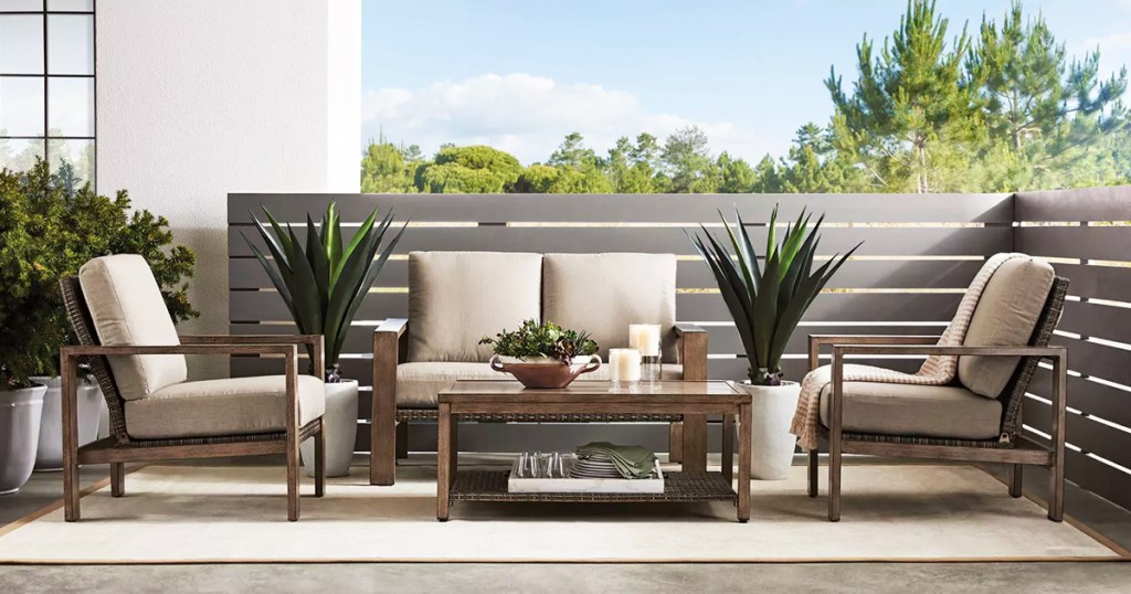 patio set with two chairs, loveseat, and coffee table